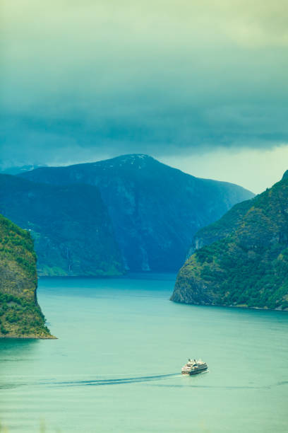 istock Cruise ship ferryboat on norwegian fjord 848952918