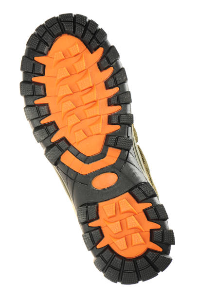 istock Gray brown soles on some white spots on the background 848970840