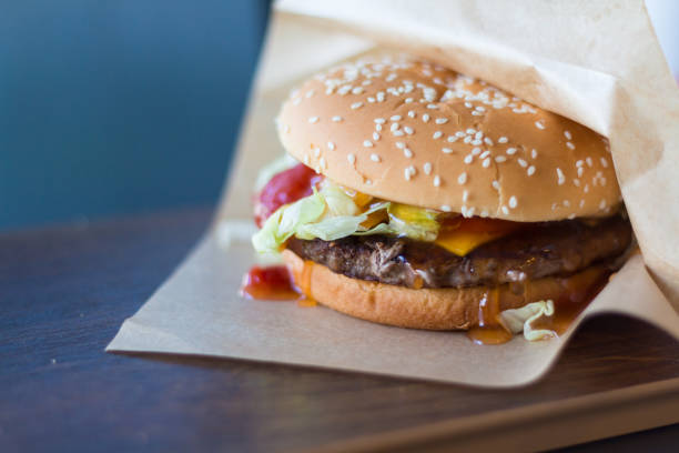 istock juicy hamburger with beef and ketchup on the table 848975118
