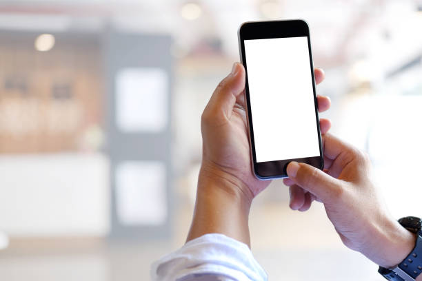 istock Business man hands holding and using mobile phone. 848988632
