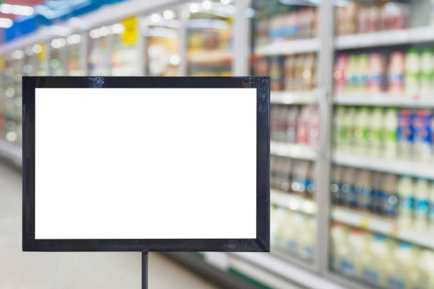 istock blank board with blur supermarket for background 848991538