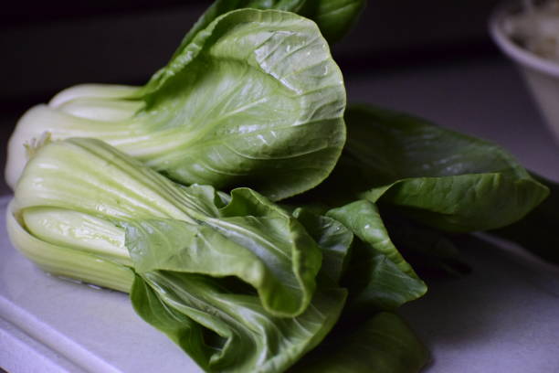 istock Some Shanghai Bok Choy Washed on the Cutting Board 848998108