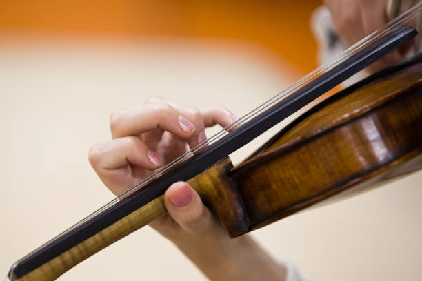 istock Hand girl on the strings violin 849000636