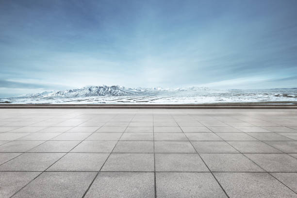 istock empty floor with beautiful snow mountains in blue sky 849004074