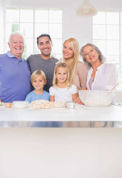 istock Smiling family posing in the kitchen 849011808