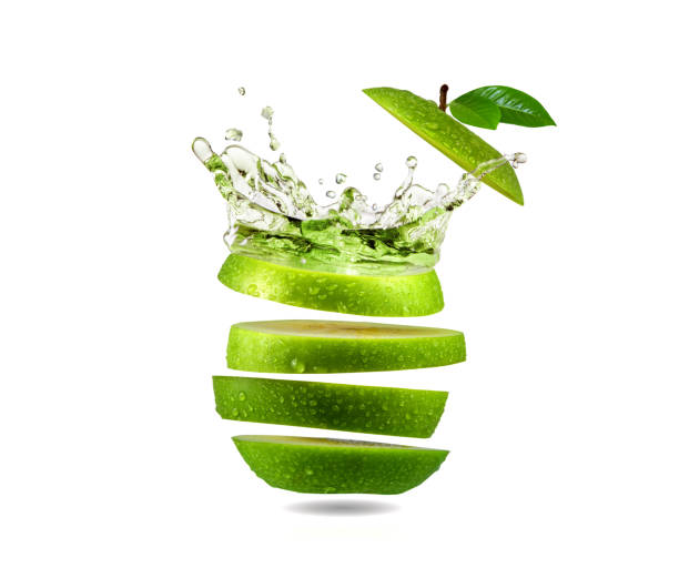 Slice green apple water splash, fruit Slice green apple water splash, fruit green apple slice stock pictures, royalty-free photos & images