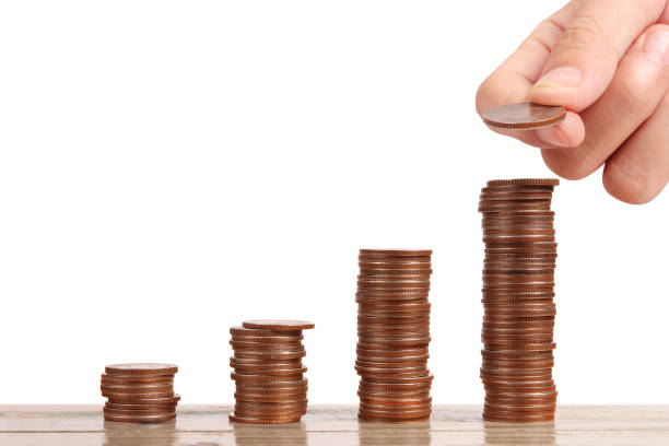 istock money growing from coins in hand 849038464