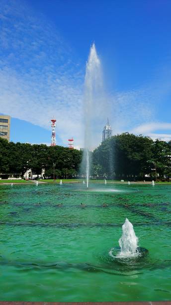 istock Fountain of the park and a building 849041864