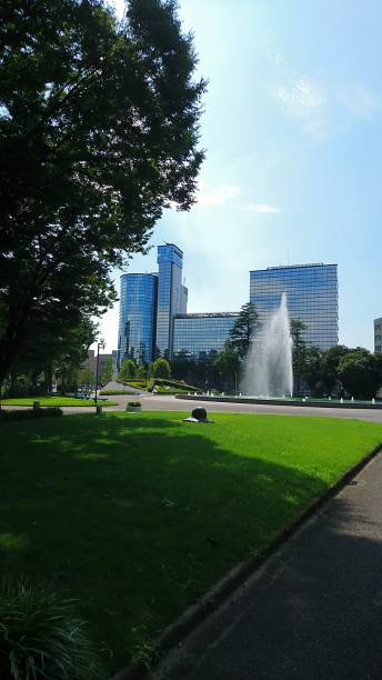 istock Fountain of the park and a building 849041894