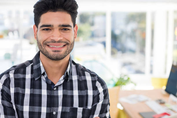 istock Male executive standing in the office 849042210