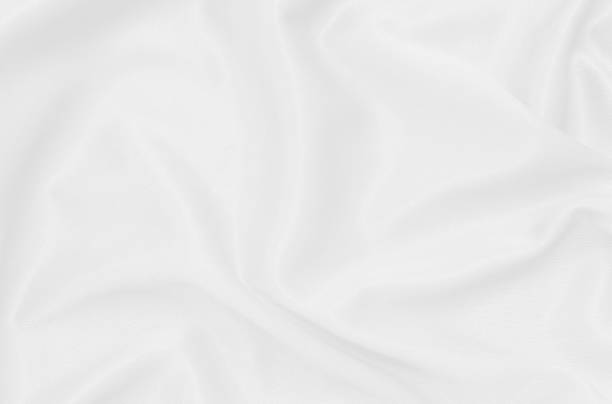 White fabric texture for background and design, beautiful pattern of silk or linen.