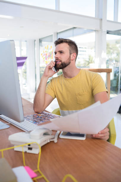 istock Male executive talking on mobile phone 849063010