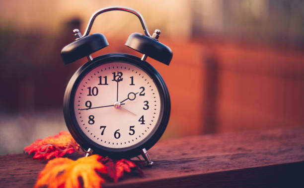 istock Alarm clock with fall leaves Daylight Savings Time 849071158