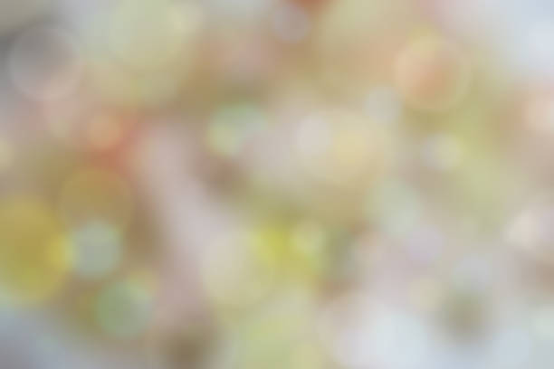 istock gray, yellow bokeh background from nature under tree shade. bokeh background from nature under tree shade. nature forest. golden and yellow circle background. studio shot,  holiday lights. 849071356