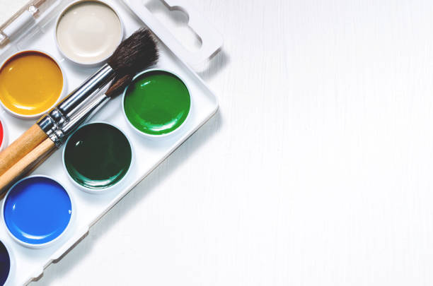 istock Watercolors and brushes on a white background 849077840