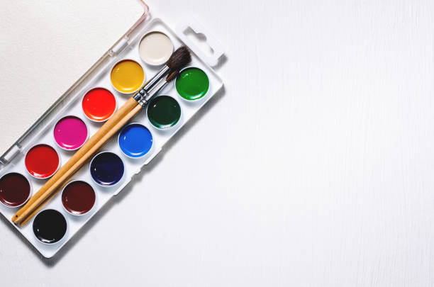 istock Watercolors and brushes on a white background 849077856