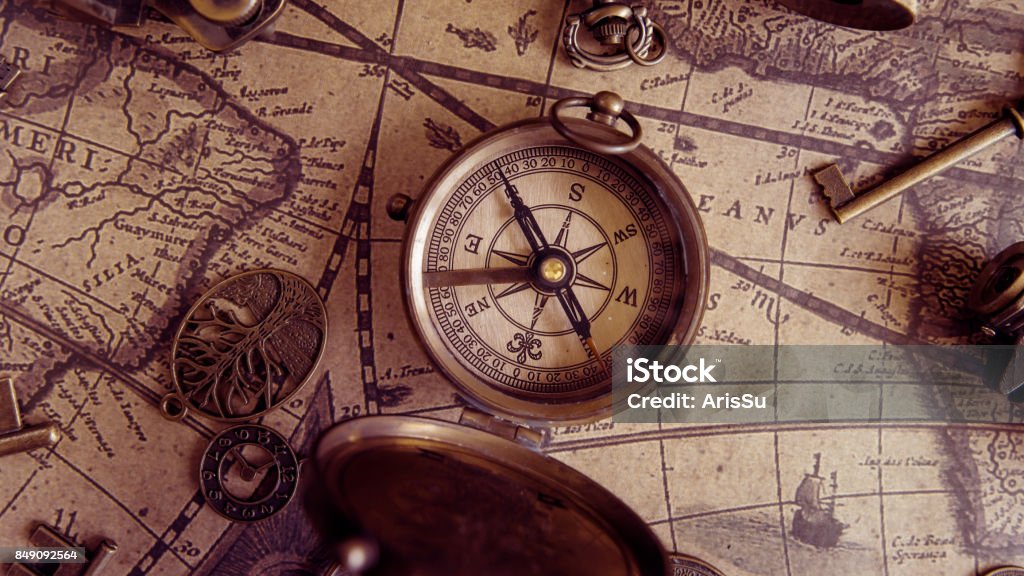 Vintage Photos Vintage Compass On Old World Map Navigational Compass Stock Photo