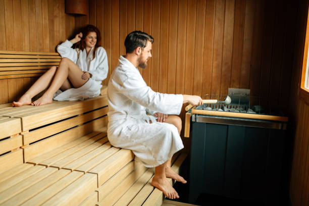 istock Beautiful couple relaxing in sauna 849102136