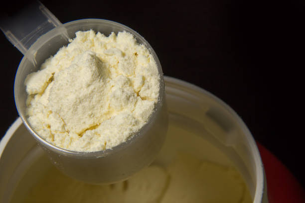 istock the whey protein powder closeup image black background 849106226