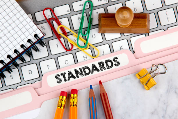 istock Standards concept. Folder Register on Background of Computer Keyboard 849106602
