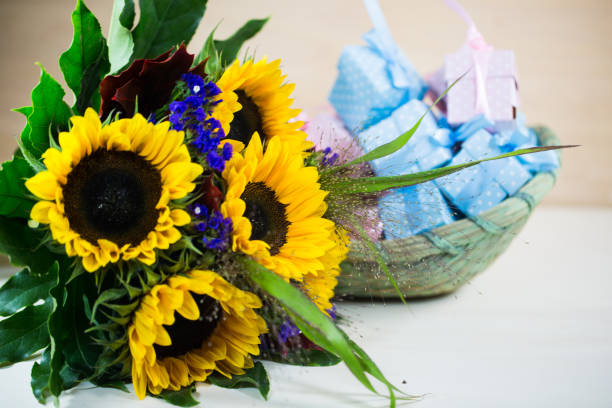 istock Sunflowers with small gifts 849111080