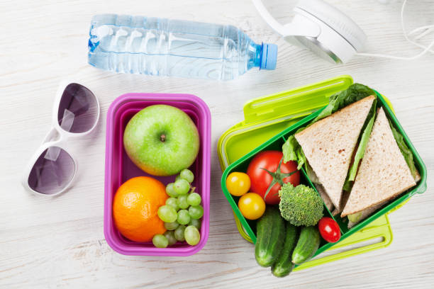 istock Lunch box with vegetables and sandwich 849113986