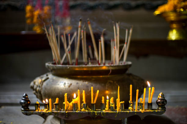 istock light candle burning for worship the buddha in the temple 849120988