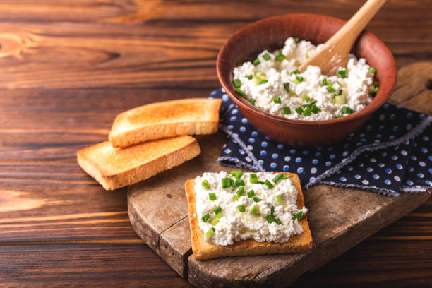 istock Goat cream cheese with green onions, dip sauce 849128458