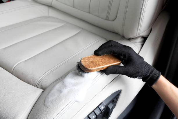 istock Car service. Washing of  interior by a brush 849128908