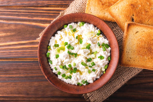istock Goat cream cheese with green onions, dip sauce 849129414