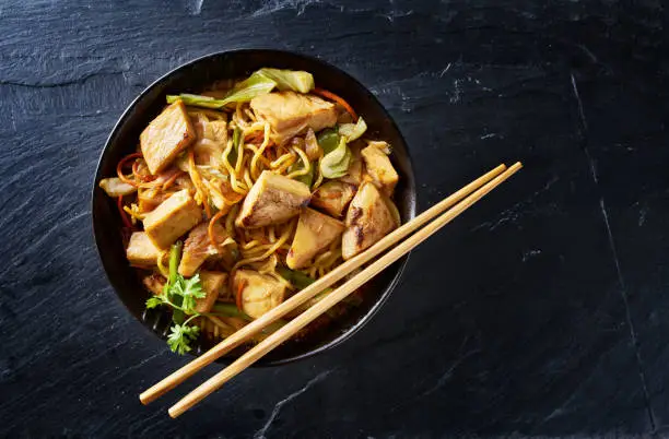 chicken yakisoba in flat lay composition with copy space