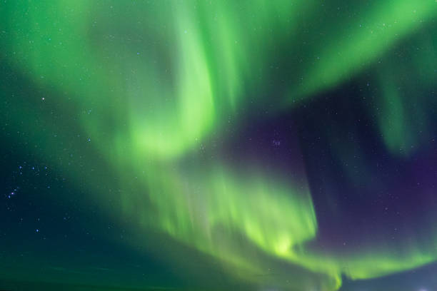 istock northern lights appear over the sky. 849129640