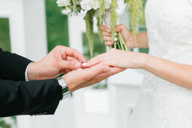 istock the groom and the bride hold each other by hands 849136632