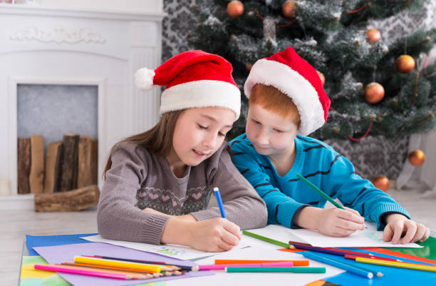 istock Children writing letter to santa, wait for christmas 849141020