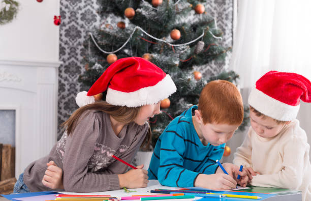 istock Children writing letter to santa, wait for christmas 849141114