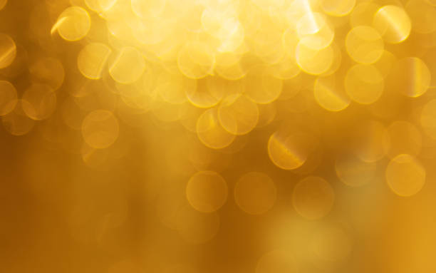 istock Golden holiday light background, beautiful shiny sparkles. 849146448