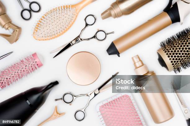 Hairdressing Tools And Various Hairbrushes On White Background Top View Stock Photo - Download Image Now