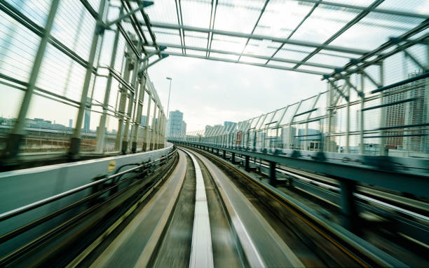 istock Train moving on city rail with motion blur 849147962