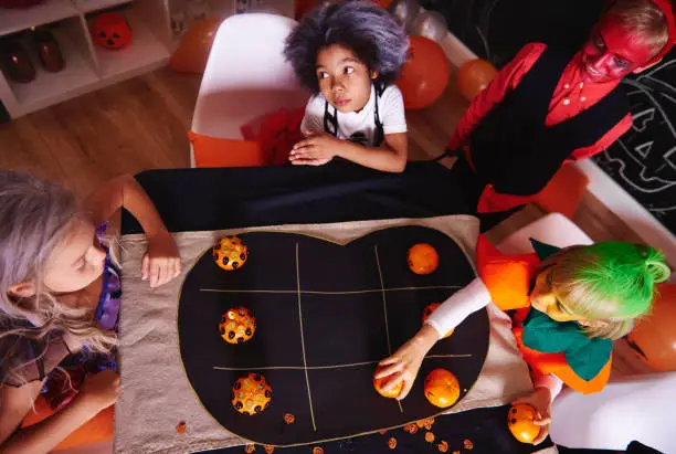 Photo of Kids spending time together while party game