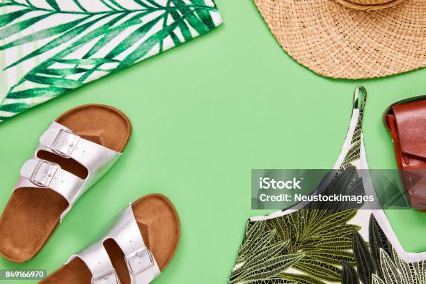 Overhead Shot Of Top Sandal Sun Hat And Leather Purse Stock Photo - Download Image Now