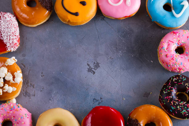 istock sweet doughnuts on gray stone background 849173806