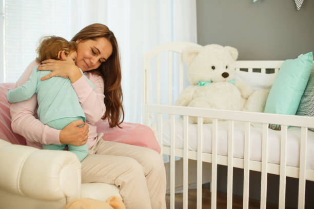 istock Mother hugging her baby girl 849176258