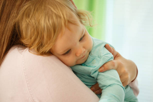 istock In a safe mother's arms 849176288