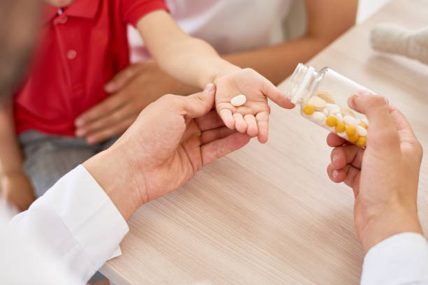 istock Giving Vitamins to Patient 849176402