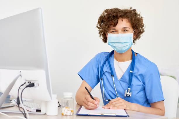 istock Portrait of Curly Physician 849176592