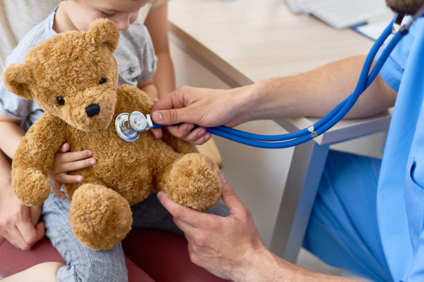 istock Young Pediatrician Playing with Little Patient 849176776