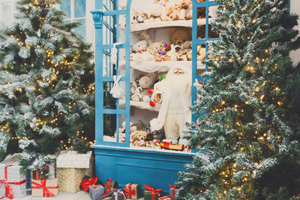 istock Christmas is coming. Decorated fir trees and presents background 849177202
