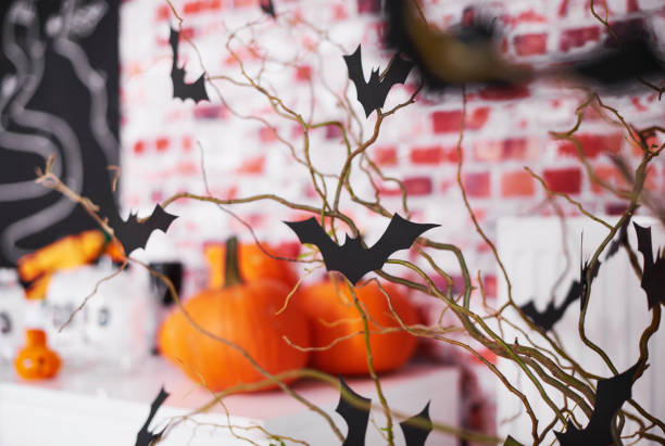 istock Halloween with bats and pumpkin decorations 849181118