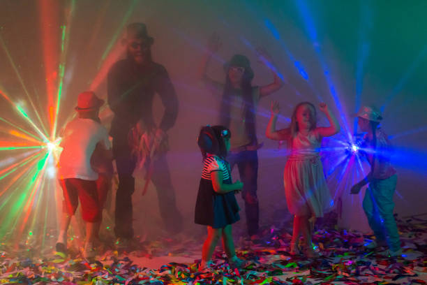 istock Children And Adults Have Fun At Disco Party 849181816
