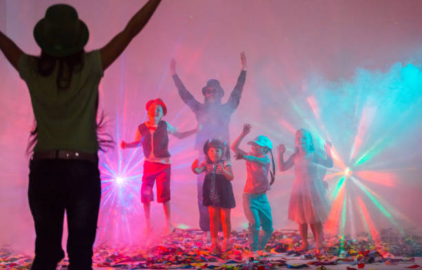 istock Animators and Children Dancing Fun at Disco Party 849181926